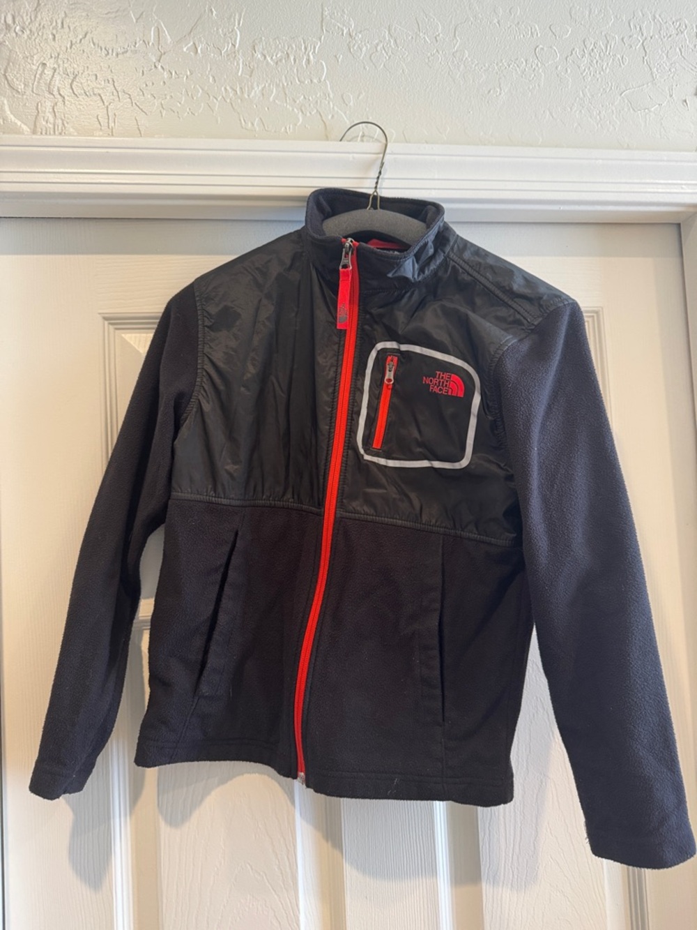 The North Face Black Fleece Jacket with Red Zipper Accents